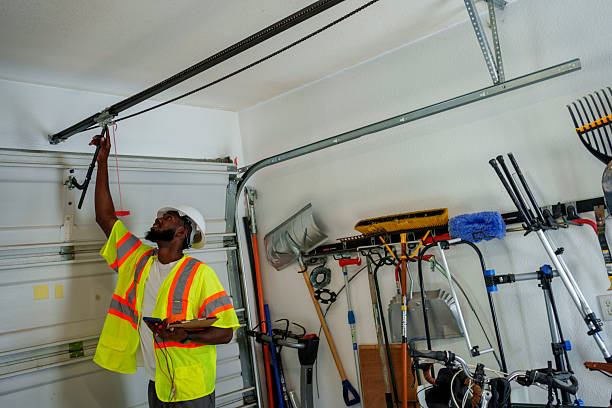 Professional Garage Door Panel Replacement technician working in Falls City, NE